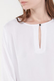 Blusa unicolor manga larga