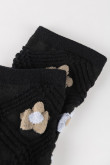 Medias largas negras con diseños de flores