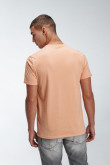 Camiseta naranja clara manga corta con estampado delantero