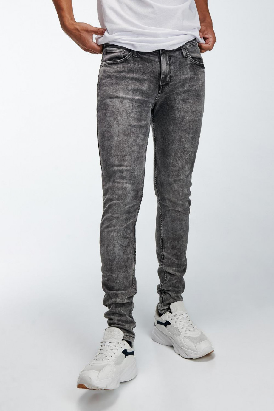 Jean gris oscuro súper skinny tiro bajo con hilos en contraste