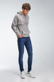 Jean súper skinny tiro bajo azul intenso con costuras cafés en contraste