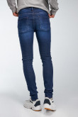 Jean súper skinny tiro bajo azul intenso con costuras cafés en contraste