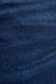 Jean skinny tiro bajo azul intenso con costuras amarillas en contraste