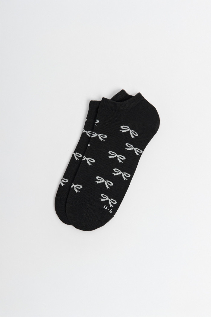 Medias unicolores tobilleras con diseño de moños