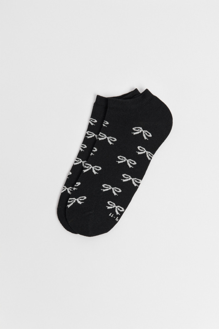 Medias unicolores tobilleras con diseño de moños