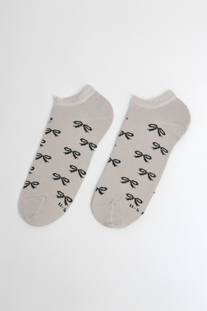 Medias unicolores tobilleras con diseño de moños