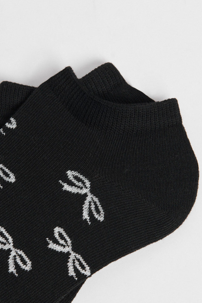 Medias unicolores tobilleras con diseño de moños