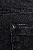 Jean skinny tiro bajo gris oscuro con botón en la pretina y 5 bolsillos