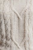 Suéter tejido unicolor con cuello en V y hombros caídos