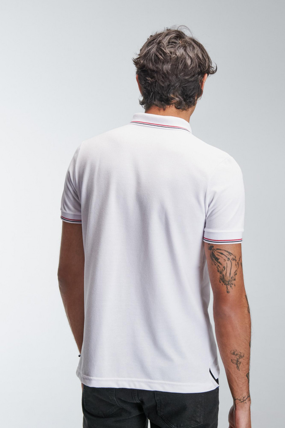 Camiseta Polo unicolor con cuello y puños tejido