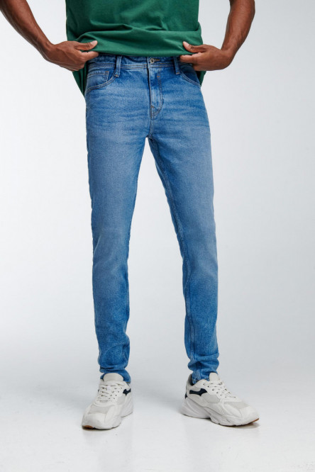 Jean súper skinny azul medio con tiro bajo y 5 bolsillos