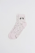 Medias unicolores cortas con puntos y diseño de perritos