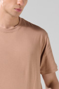 Camiseta en algodón unicolor manga corta con hombro rodado