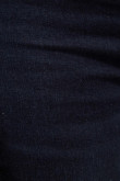 Jean jegging azul intenso con costuras cafés y tiro alto