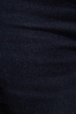 Jean jegging azul intenso con costuras cafés y tiro alto