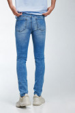 Jean azul medio tipo súper skinny con costuras en contraste