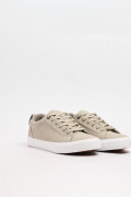 Tenis unicolores casuales con suelas en contraste planas 
