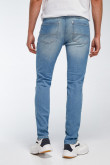 Jean skinny fit tiro bajo azul claro con hilos en contraste