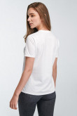 Camiseta crema clara cuello redondo con estampado de Los Supersónicos