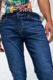 Jean skinny azul intenso con tiro bajo y costuras bicolores en contraste