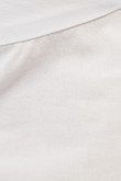 Blusa unicolor con mangas tipo globo y puño resortado