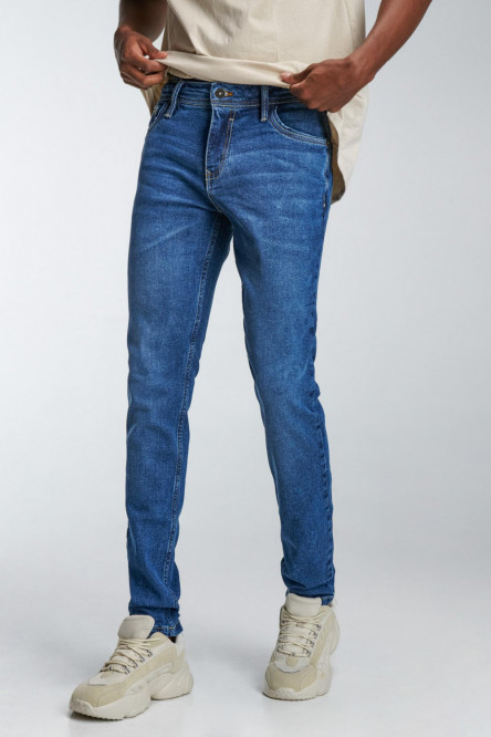 Jean azul oscuro tipo skinny fit con detalles en láser