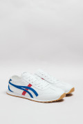 Tenis unicolores casuales con texturas perforadas y diseños
