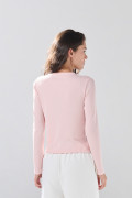 Camiseta ajustada en rib unicolor con manga larga
