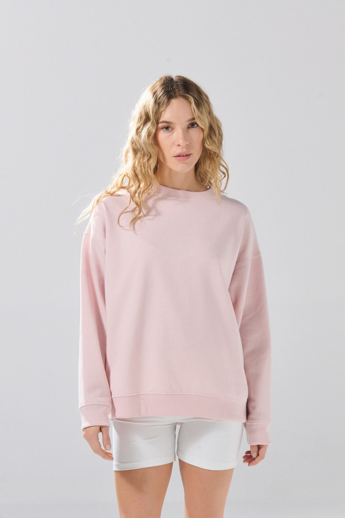 Buzo oversize cuello redondo unicolor con hombro caído
