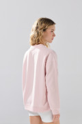 Buzo oversize cuello redondo unicolor con hombro caído

