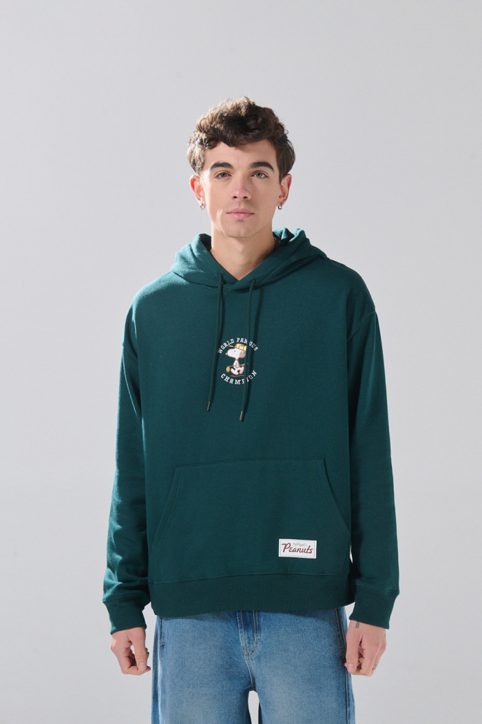 Buzo con capota verde oscuro oversize y diseños de Snoopy

