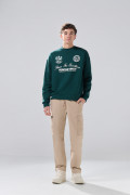 Buzo oversize cuello redondo verde oscuro con arte college
