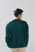Buzo oversize cuello redondo verde oscuro con arte college
