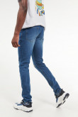 Jean skinny azul medio tiro bajo con rotos y parches en frente