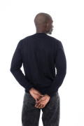 Buzo cuello redondo infaltables unicolor con bordes en rib
