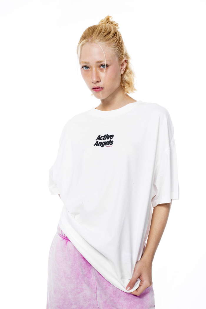 Camiseta crema clara oversize manga corta con diseños
