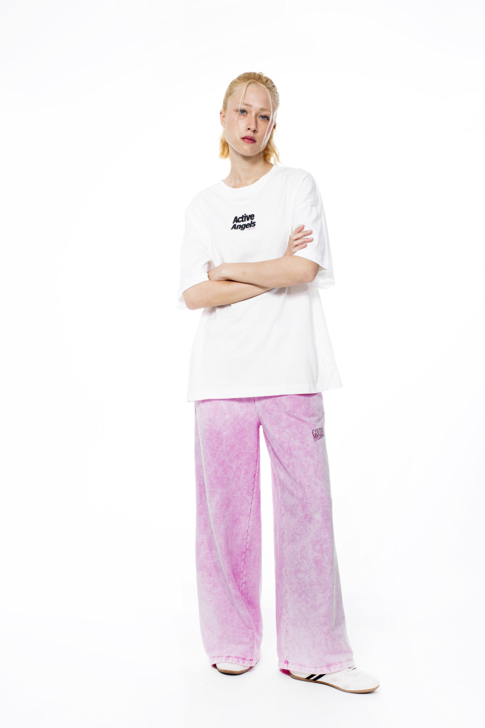 Camiseta crema clara oversize manga corta con diseños
