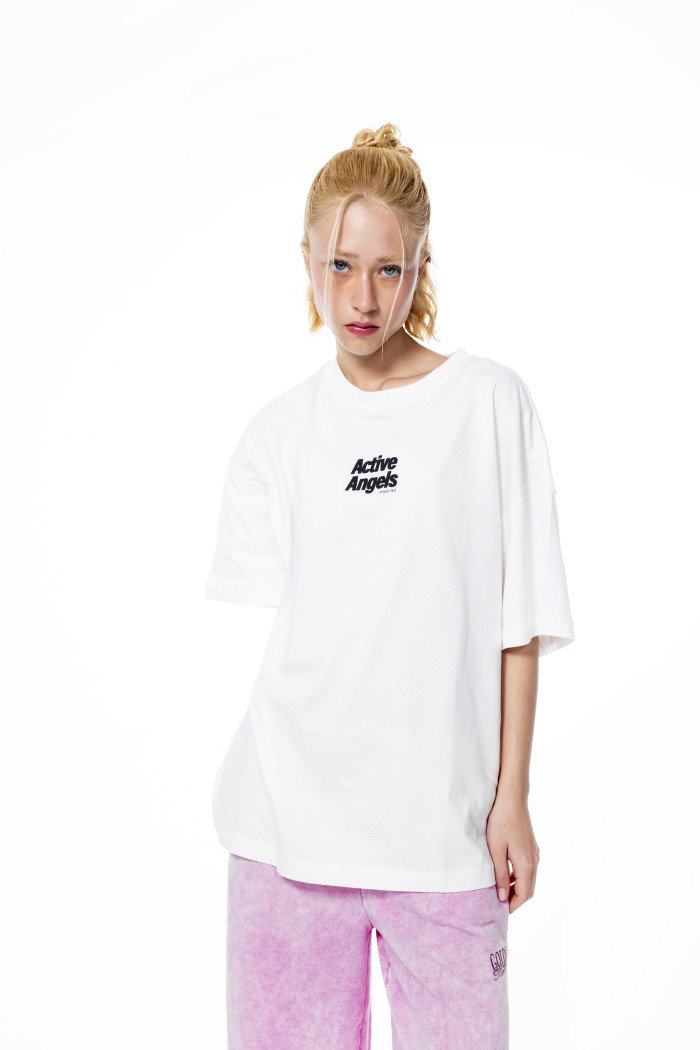 Camiseta crema clara oversize manga corta con diseños
