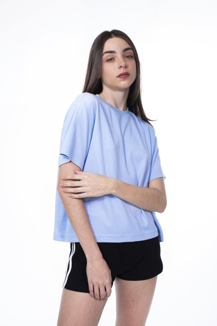 Camiseta unicolor oversize cuello redondo con hombro caído
