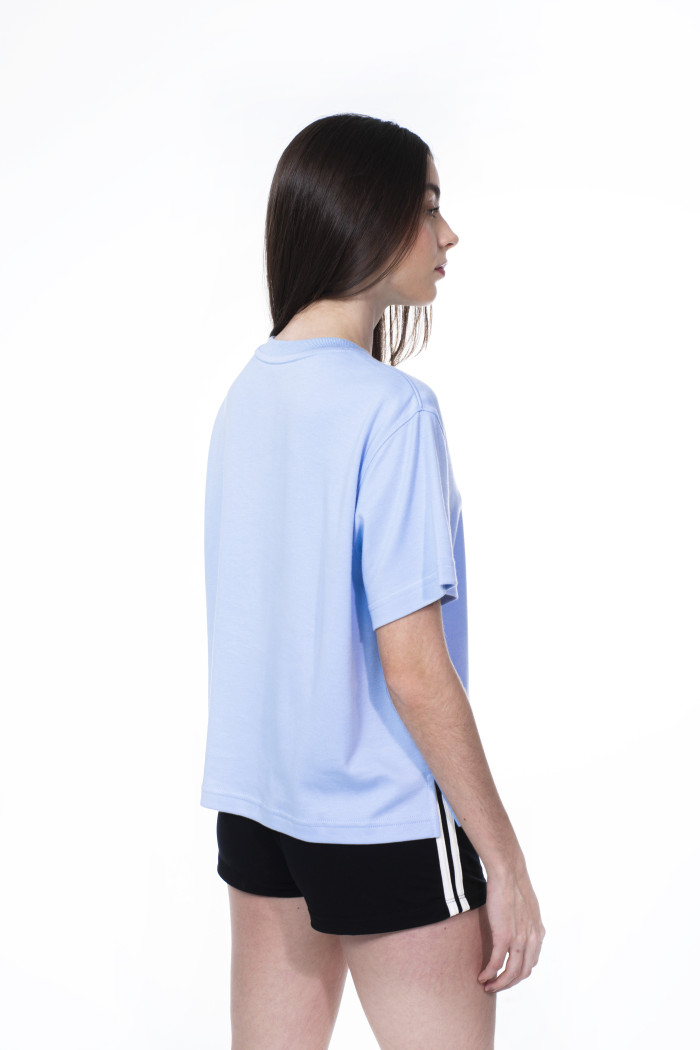 Camiseta unicolor oversize cuello redondo con hombro caído
