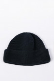 Gorro tejido unicolor con texturas de canal y doblez ajustable