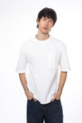 Camiseta oversize unicolor manga corta con bolsillo
