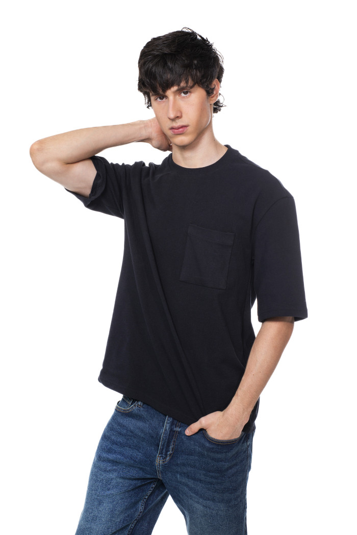 Camiseta oversize unicolor manga corta con bolsillo
