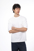 Camiseta oversize unicolor manga corta con bolsillo
