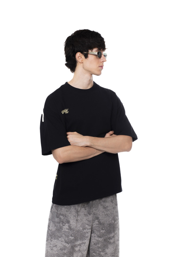 Camiseta oversize unicolor con textos y manga corta
