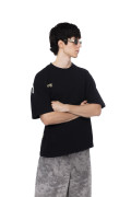Camiseta oversize unicolor con textos y manga corta

