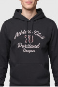Buzo negro perchado oversize con arte college y capota