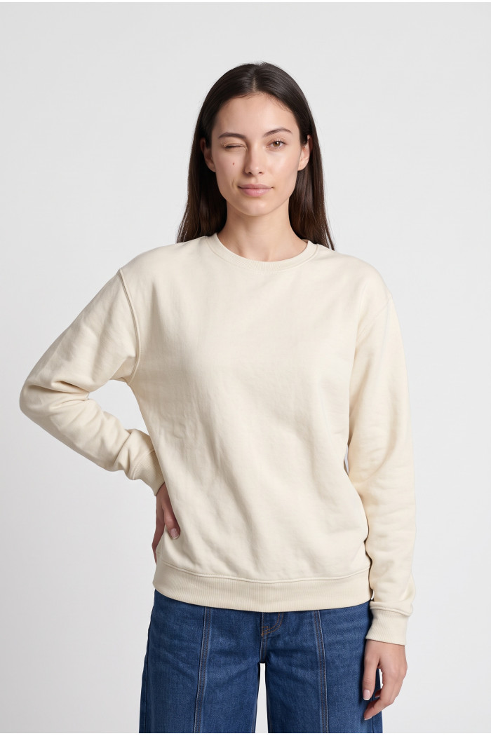 Buzo oversize con capota crema claro y artes college
