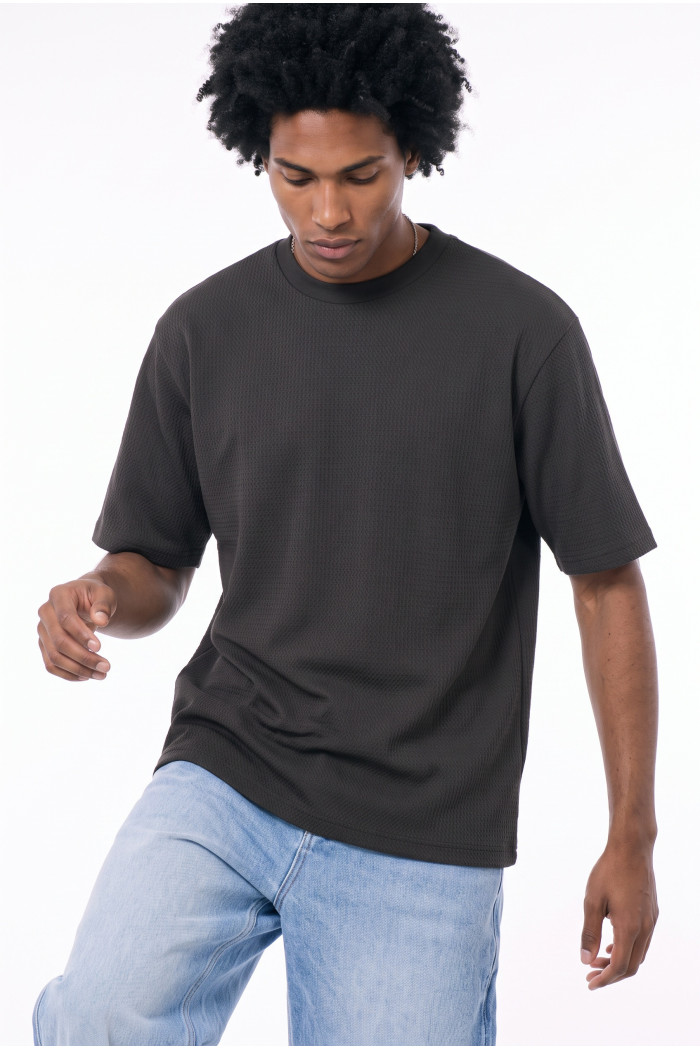 Camiseta unicolor oversize manga corta con corte posterior

