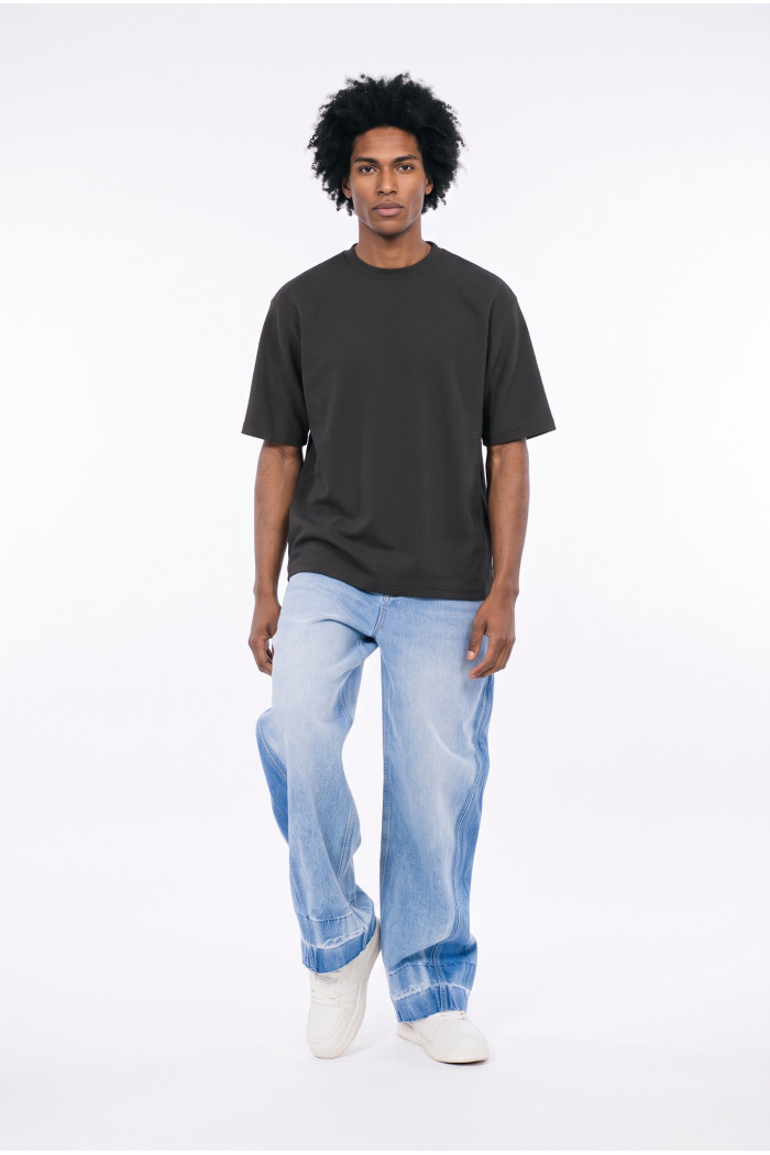 Camiseta unicolor oversize manga corta con corte posterior
